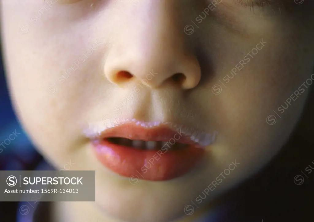 Young child´s face, close-up of mouth