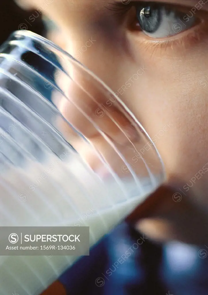 Young child drinking milk, close-up