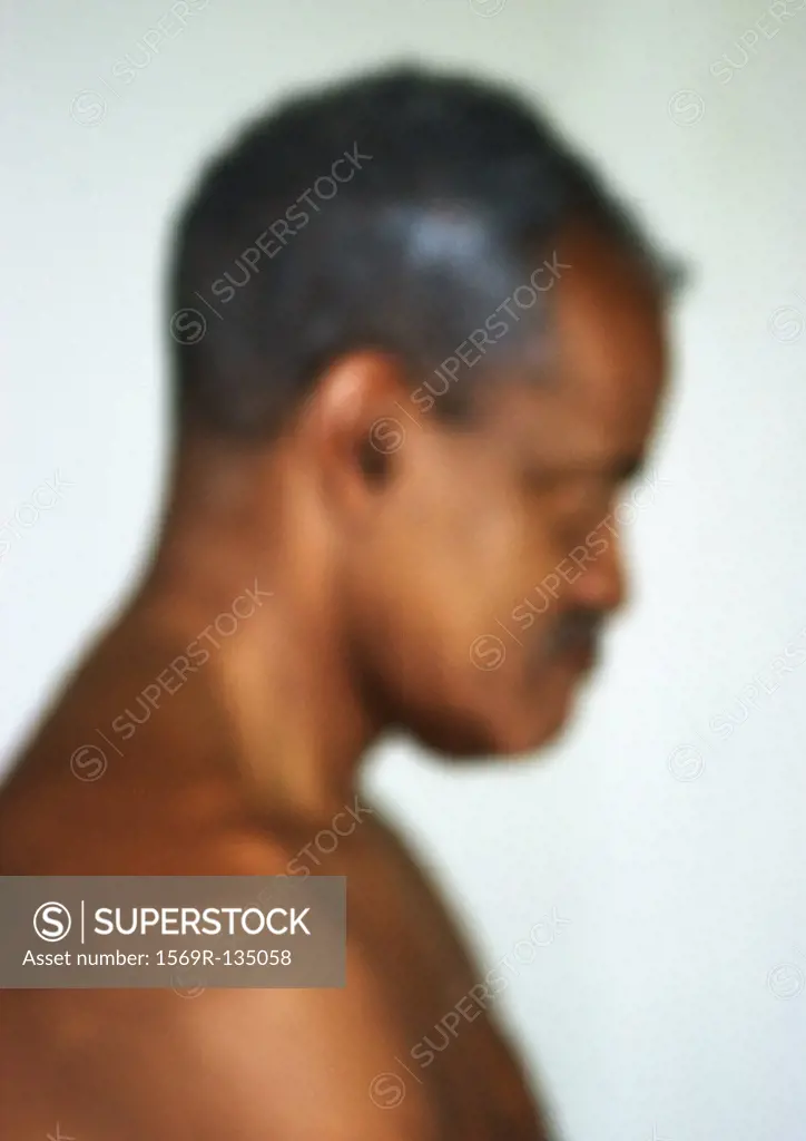 Senior man, close-up, portrait, side view, blurred