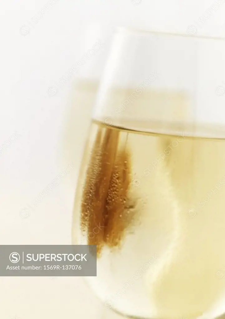 Glass of white wine, close-up