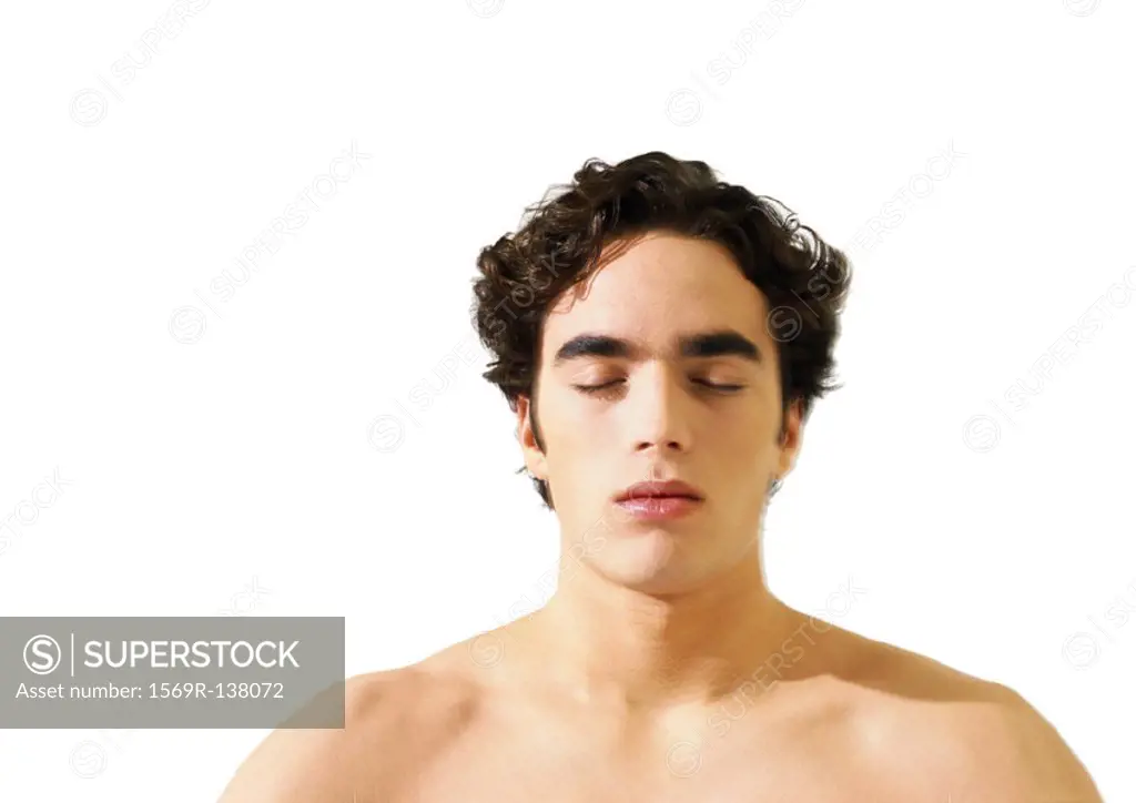 Topless man with eyes closed, head and shoulders