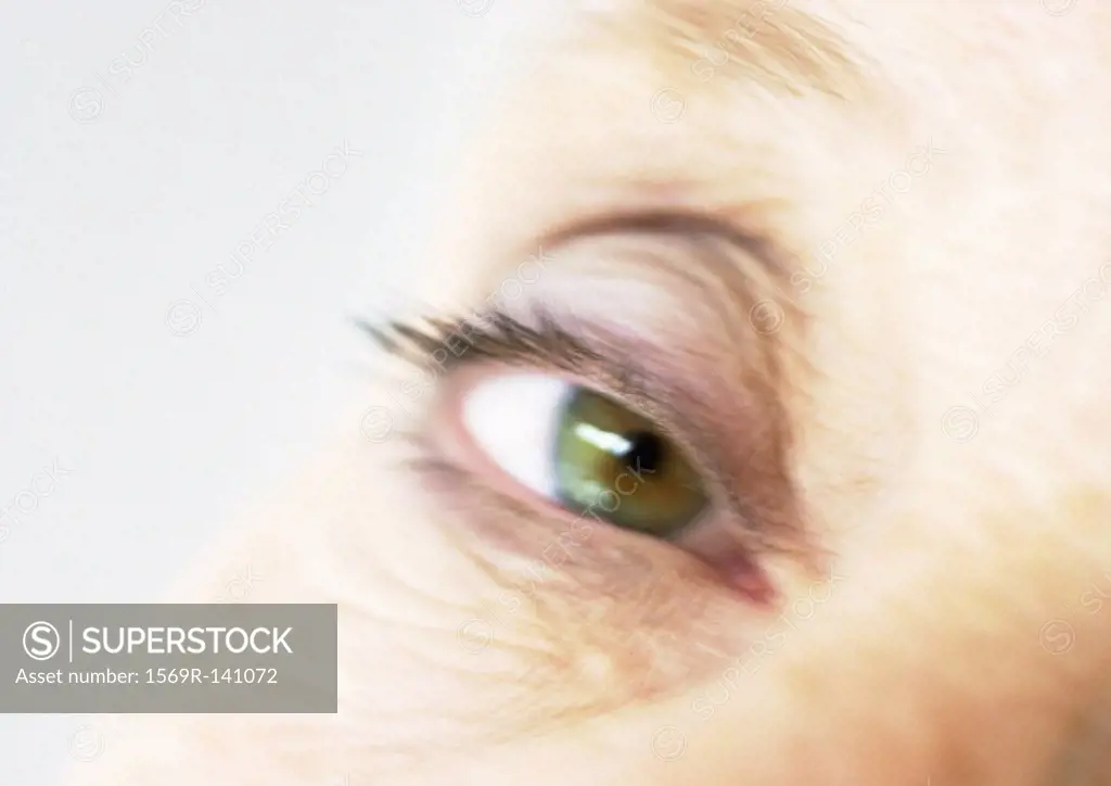 Senior woman´s eye, close-up, blurred