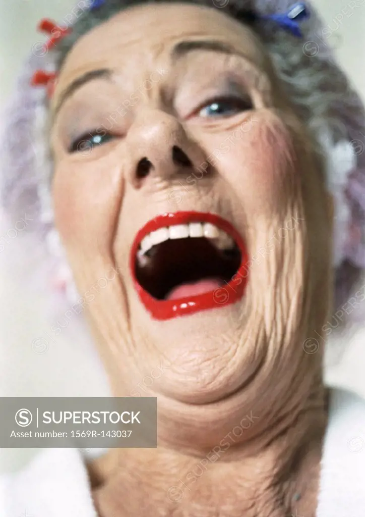 Elderly woman laughing, portrait, close-up