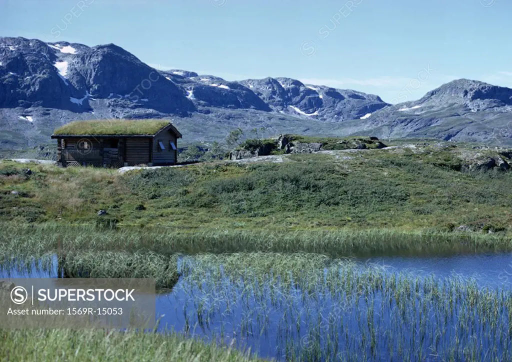 Scandinavia, log cabin in mountains