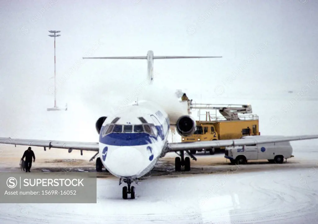 Finland, plane on snowy runway
