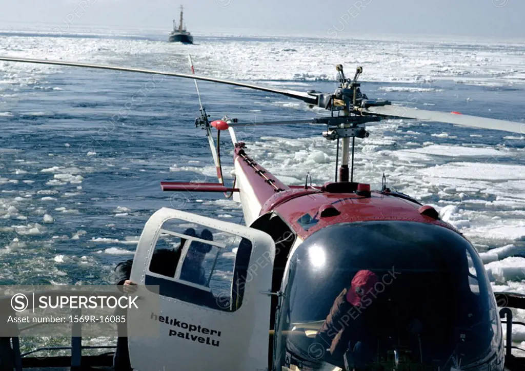 Scandinavia, helicopter on icy water