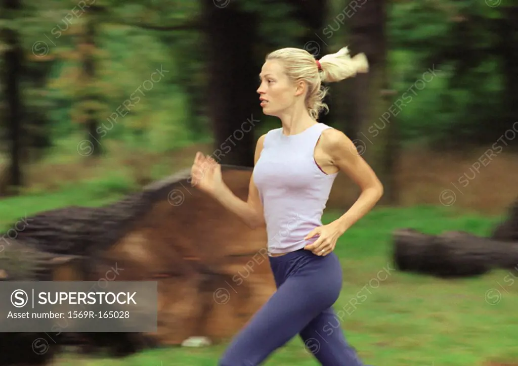 Woman running, side view