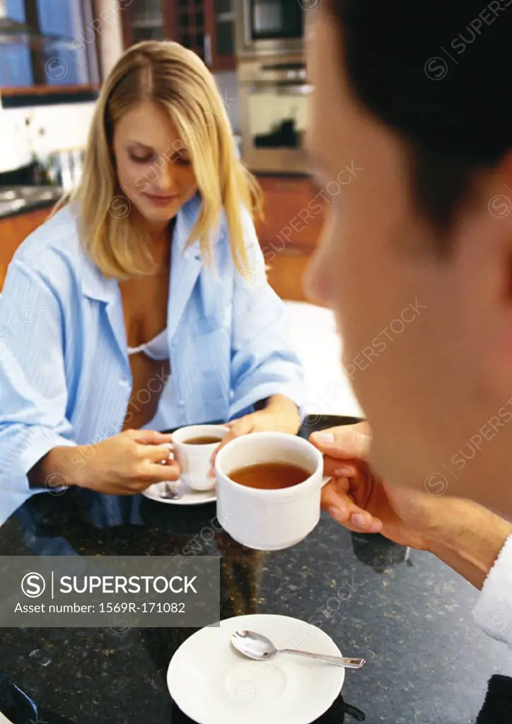 Man and woman having tea