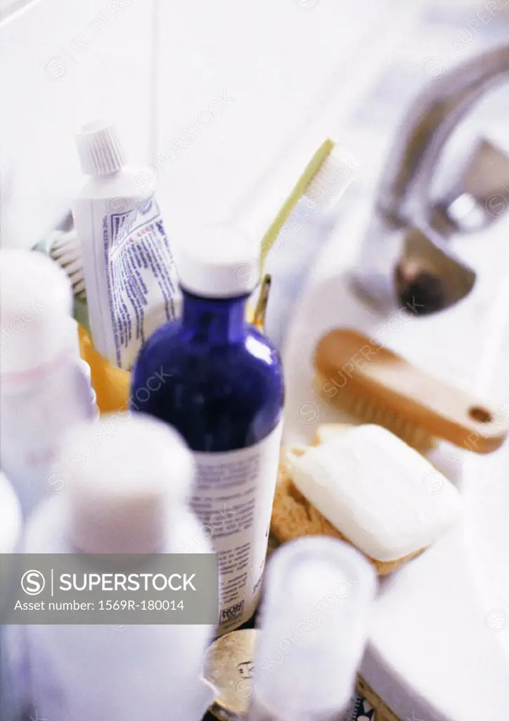 Cosmetics on side of sink, close-up