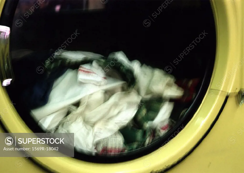 Close piled in dryer, blurred
