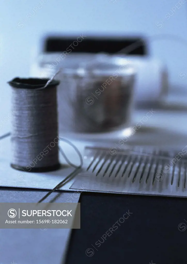 Thread and sewing needles, close-up