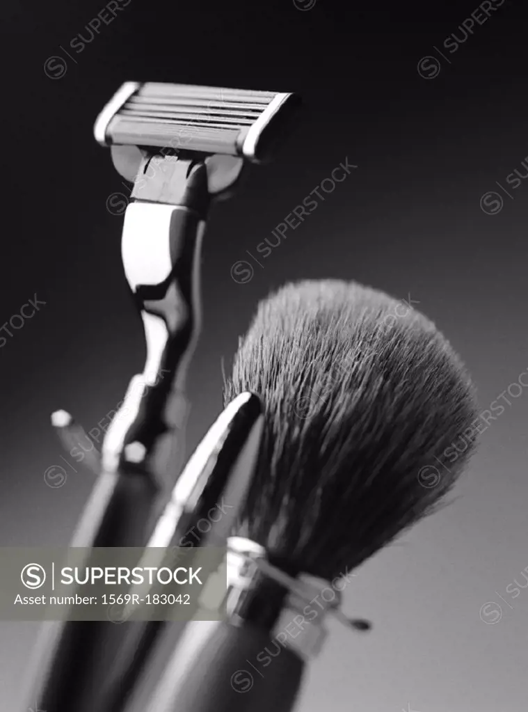 Razor and shaving brush, close-up, b&w