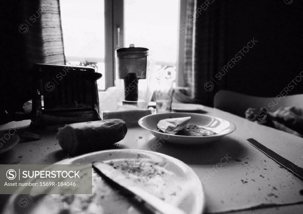 Leftovers on dirty table, b&w