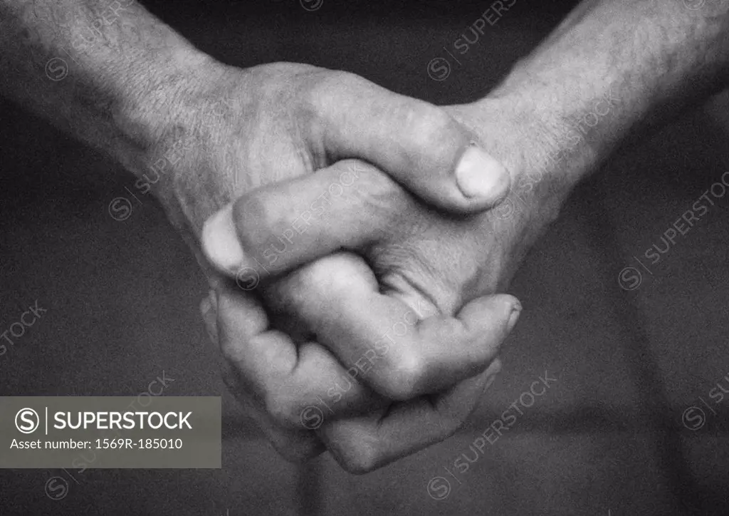 Hands together, close-up, b&w
