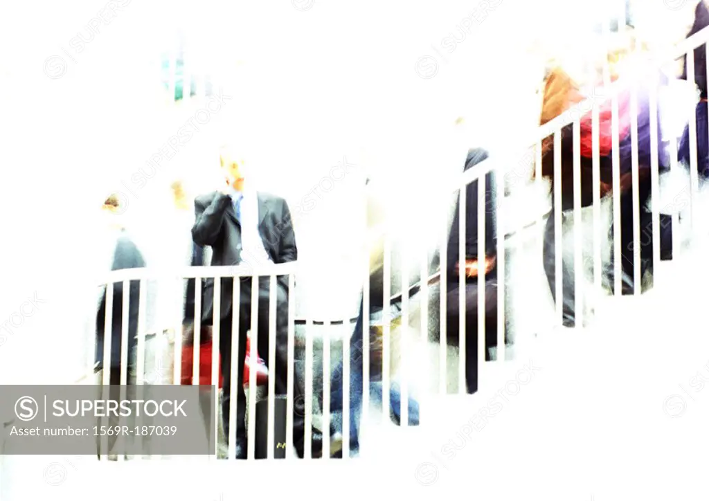 Businessman on stairs, blurred