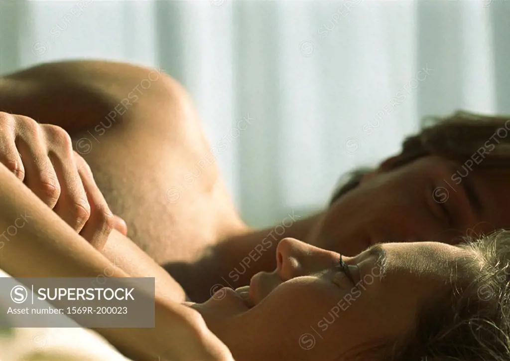 Man and woman lying next to each other, close up