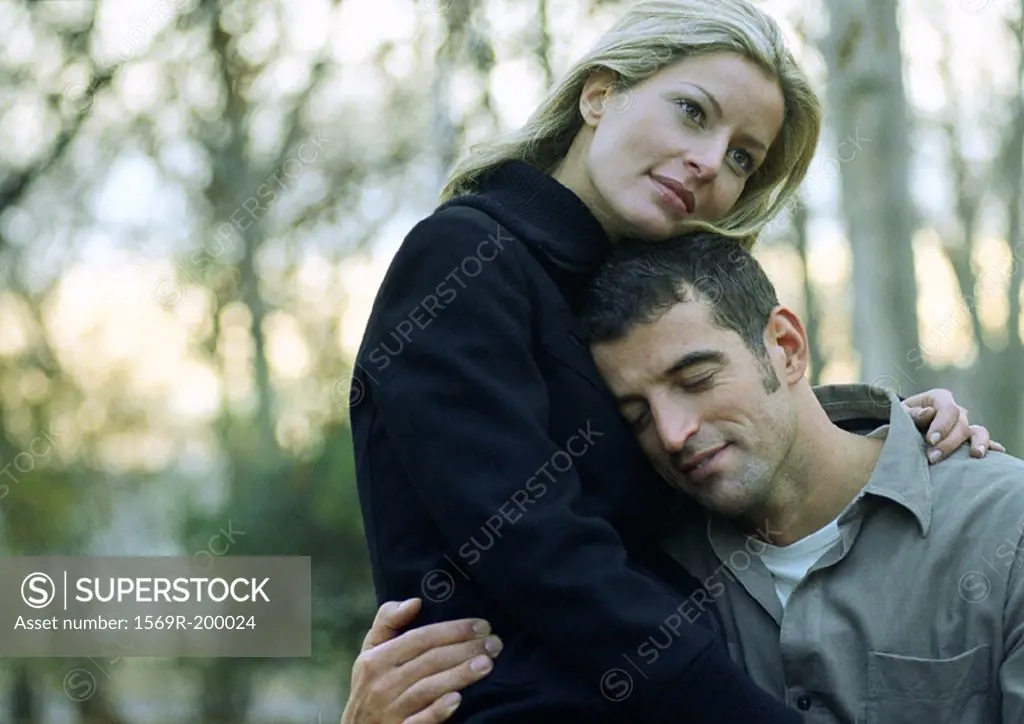 Man and woman embracing