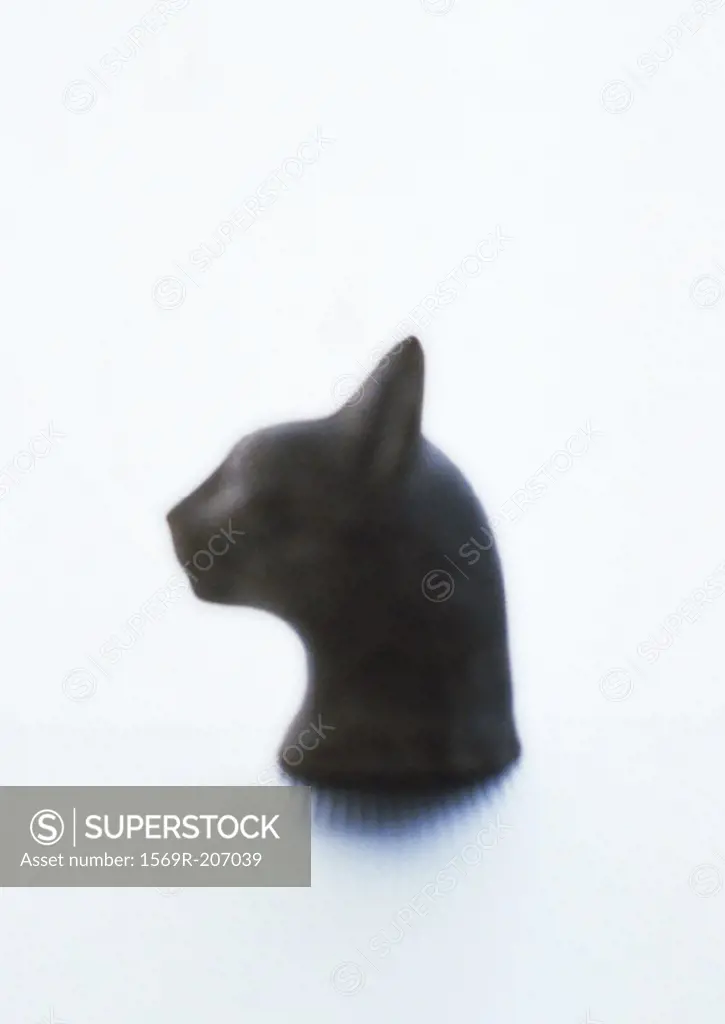 Cat head statuette, blurred