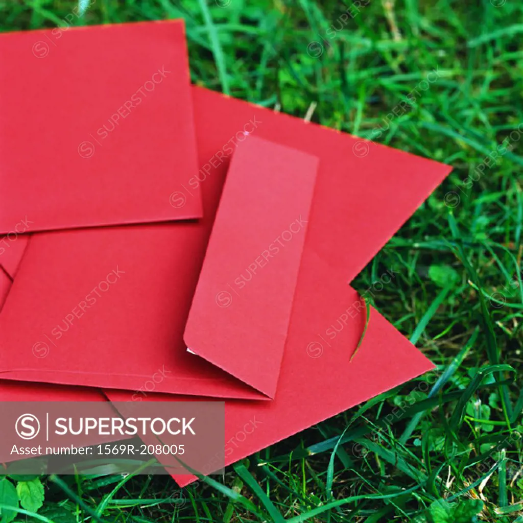 Red envelopes on grass