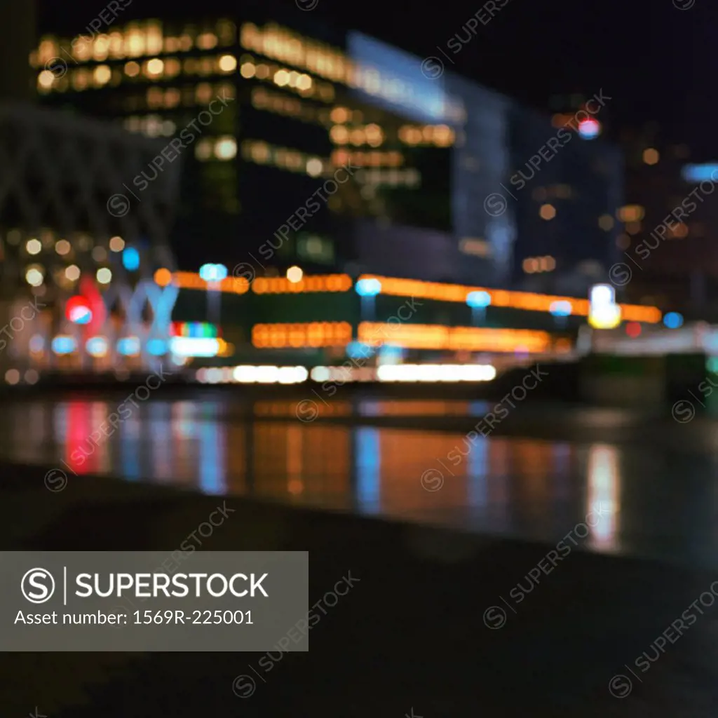 Office buildings lit up at night, exterior, long exposure