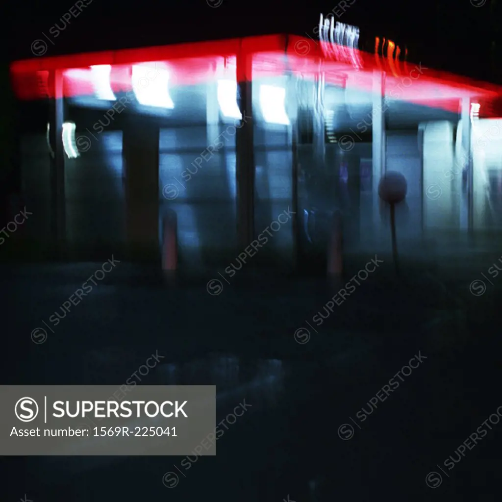 Deserted service station at night, long exposure