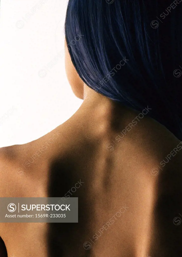 Woman´s bare upper back, close up