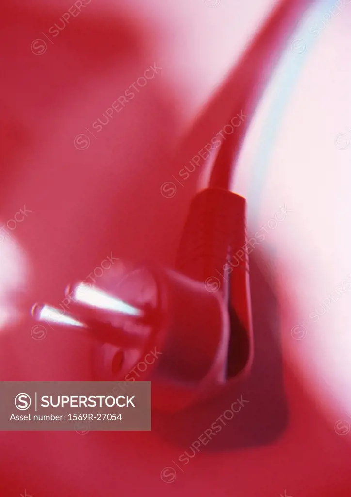 Plug, red-toned, close-up