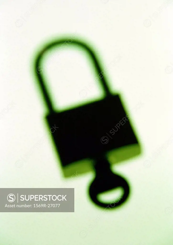 Padlock with key, blurred , close-up