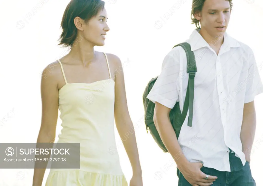 Two students walking side by side