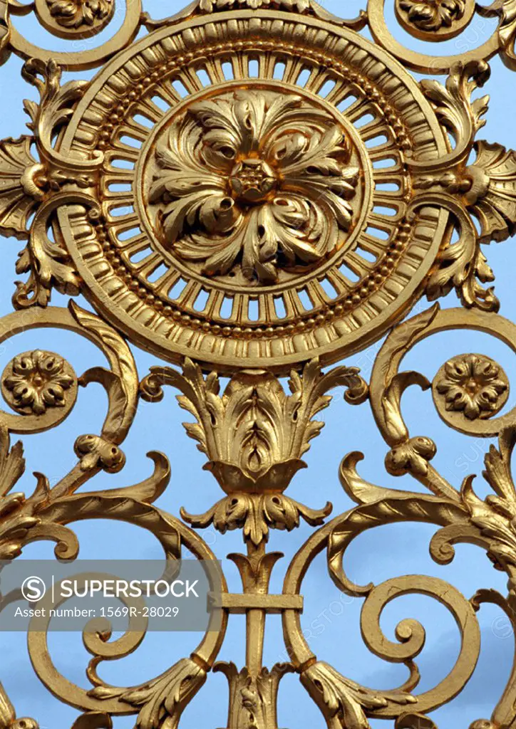 Ornate gold gate, close up