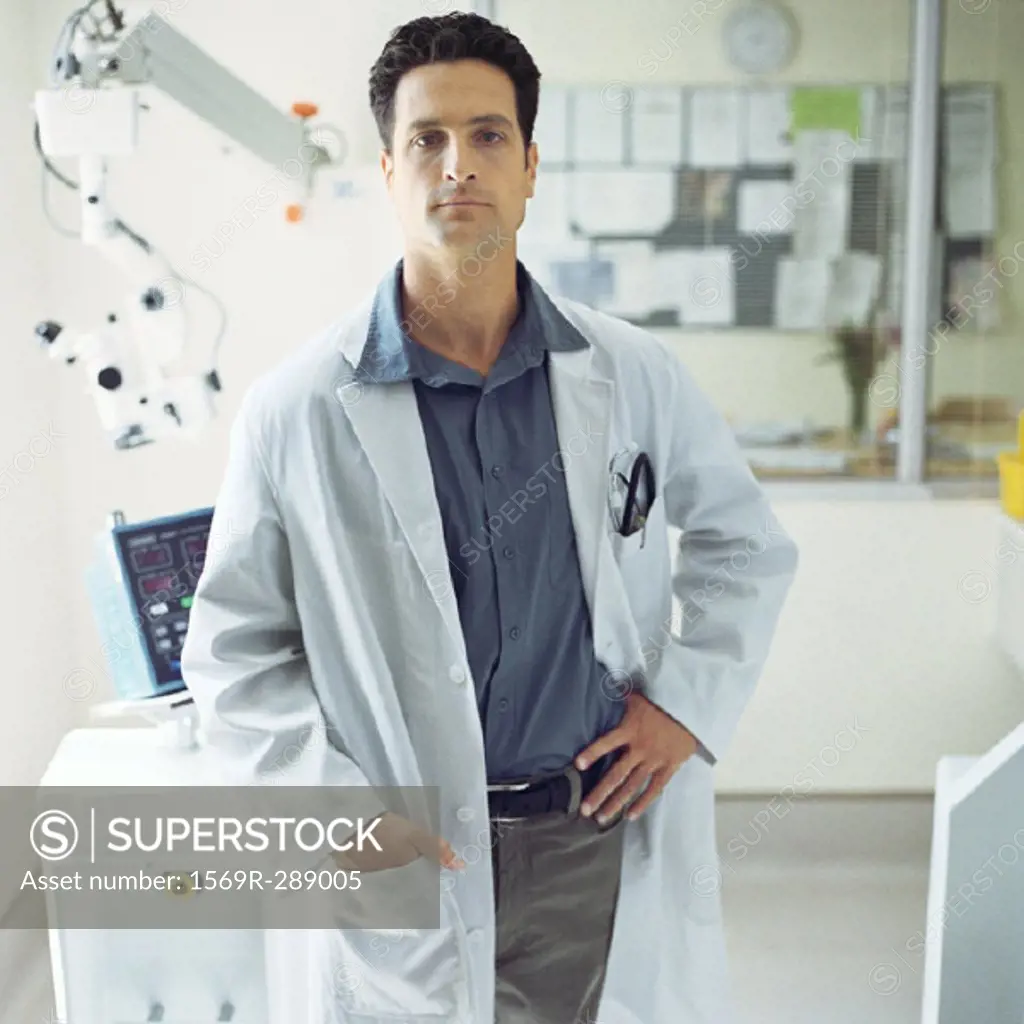 Doctor standing in front of medical equipment