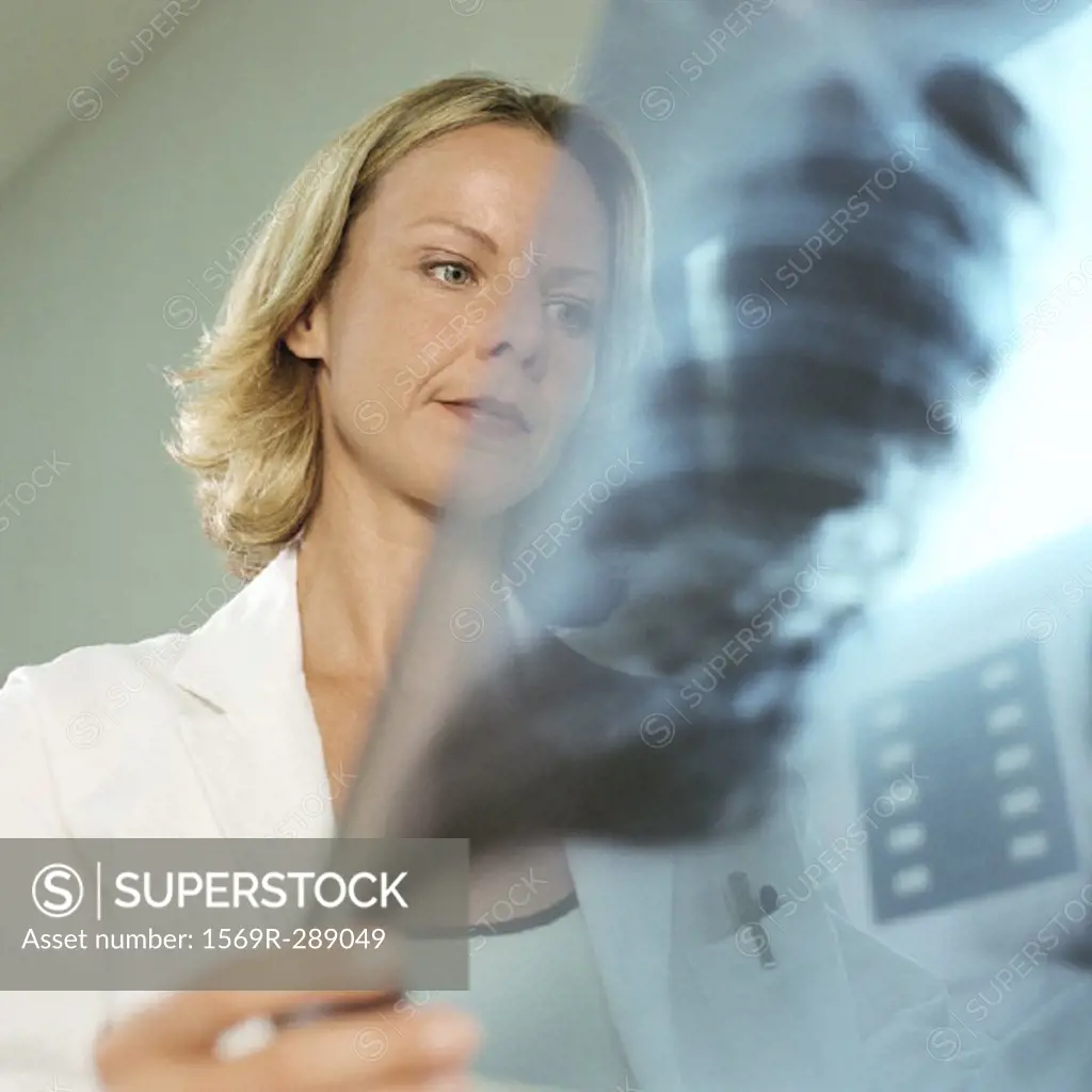 Female doctor in x-ray lab