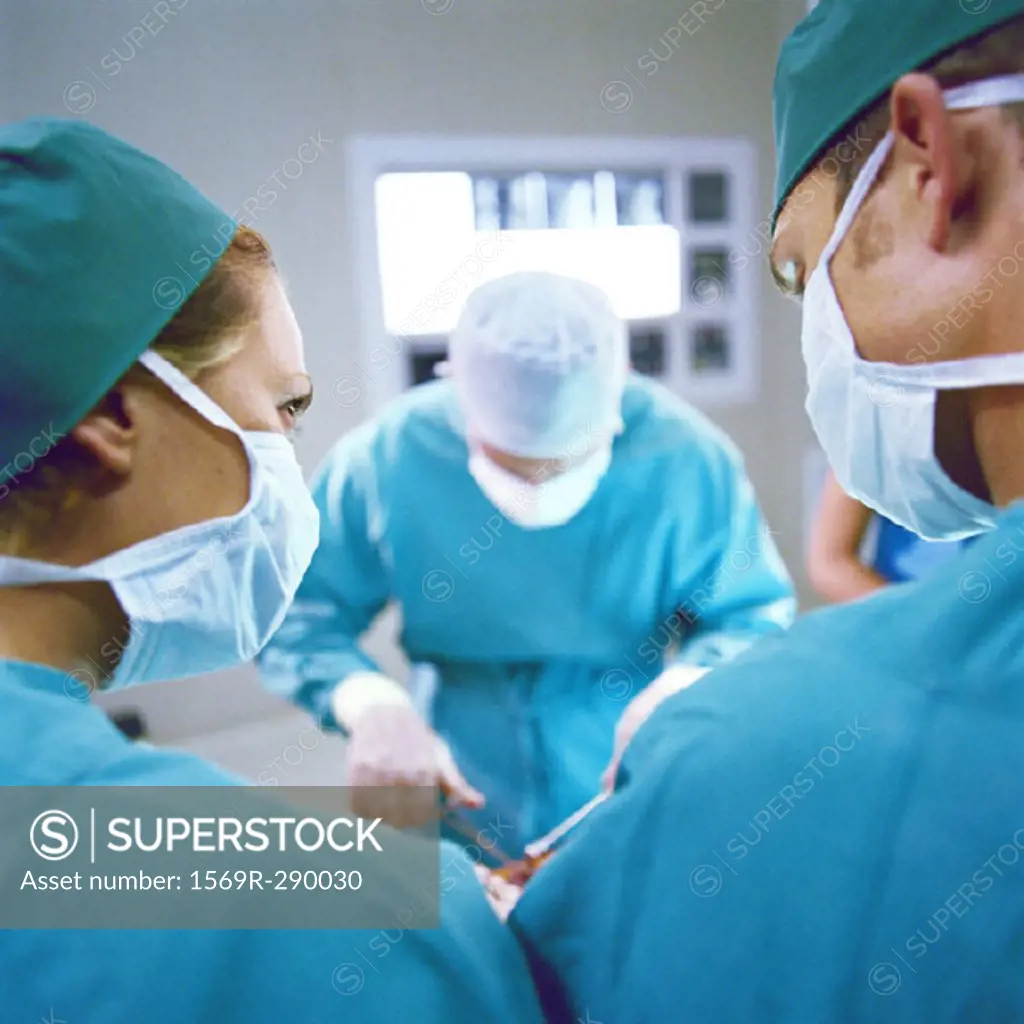 Doctors performing operation