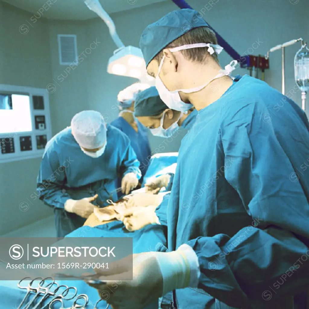 Doctors performing operation