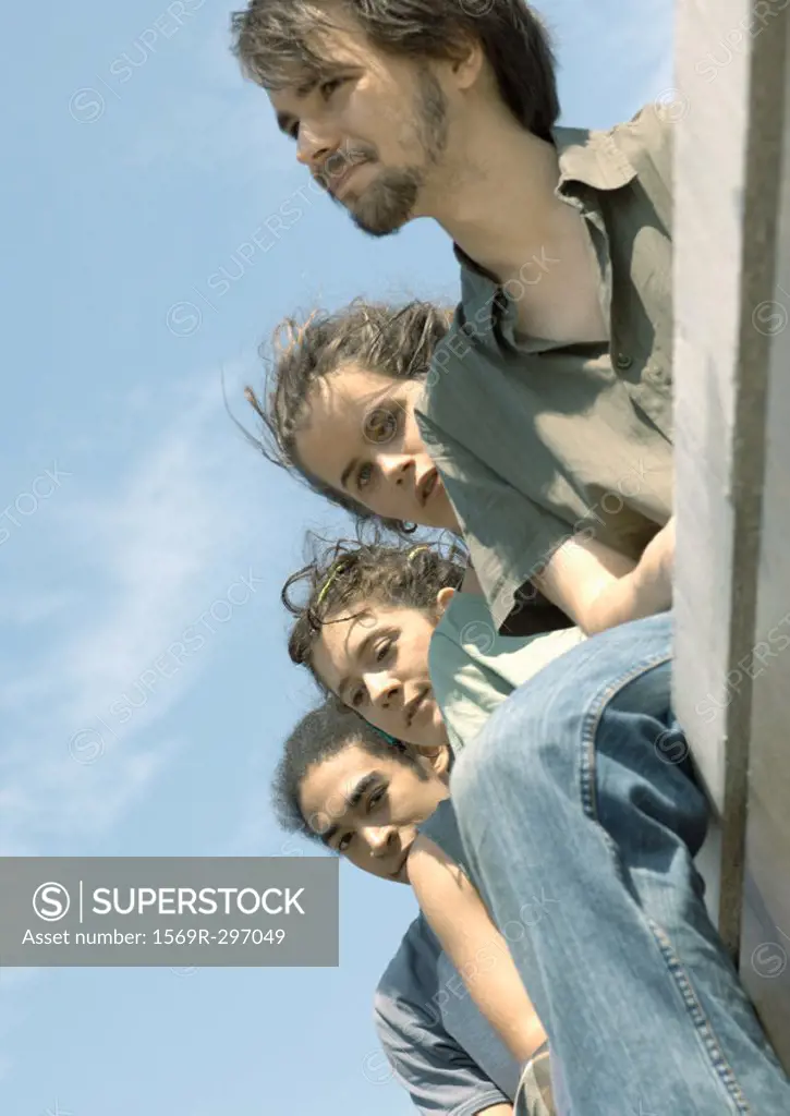 Group of young people, low angle view