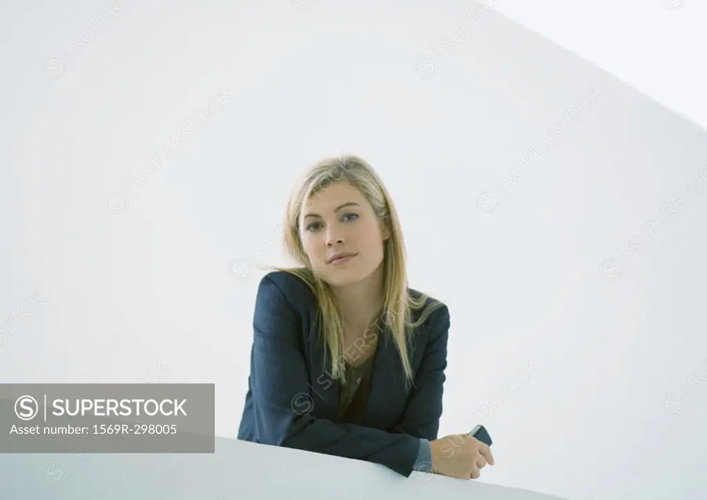 Businesswoman holding cell phone