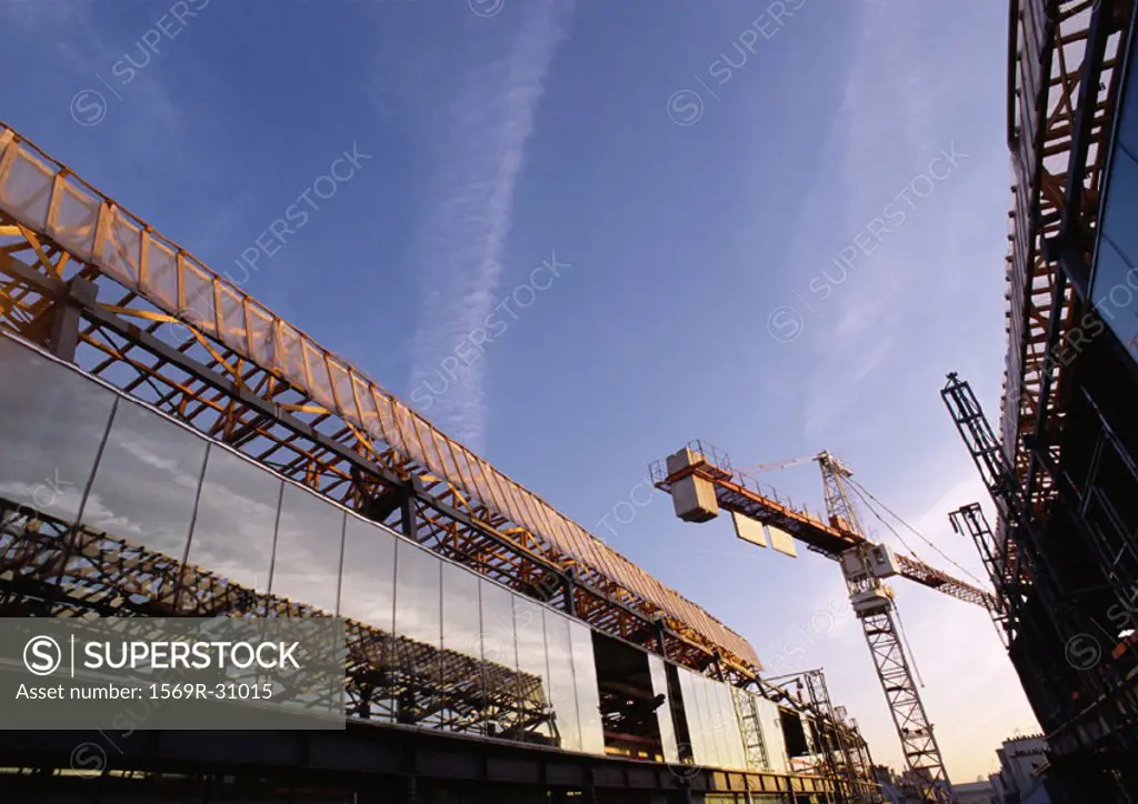 Crane in construction site, low angle view