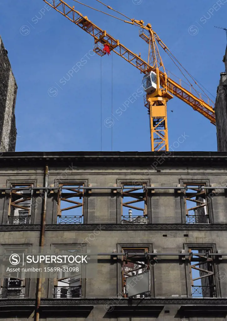 Building under construction, crane in background