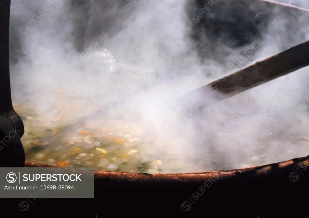Food steaming in pot, close-up