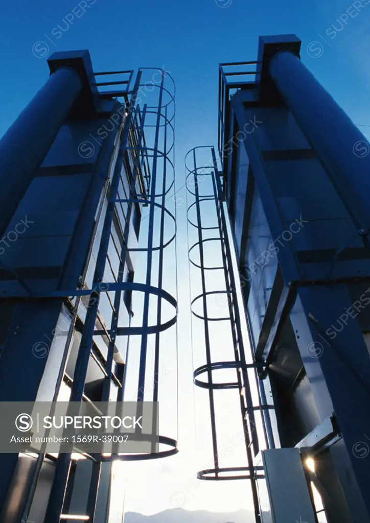 Two ladders in thermal power plant, low angle view