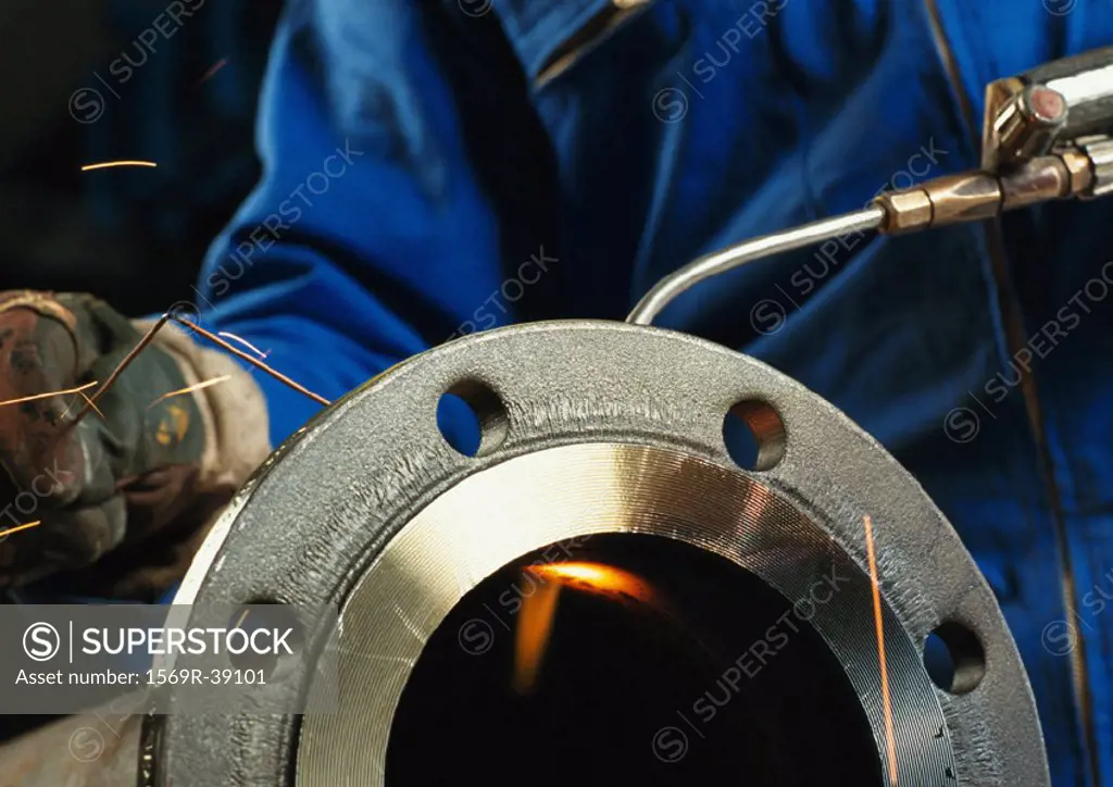 Worker welding, close-up