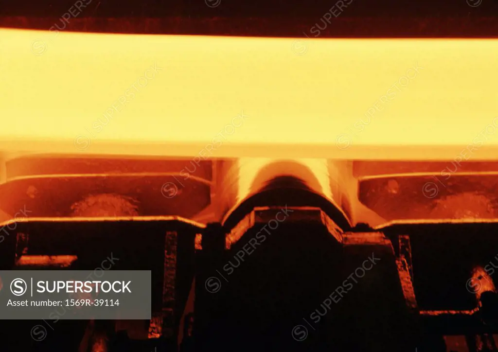 Molten metal in rolling mill, close-up