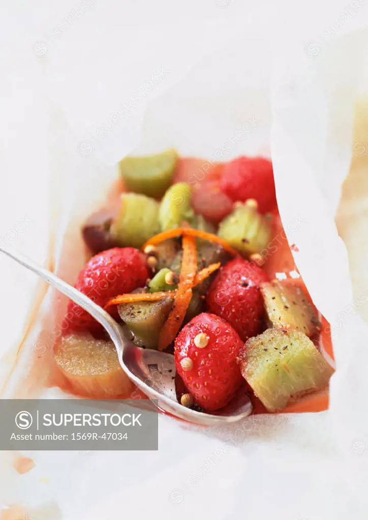 Rhubarb and strawberries in cooking paper