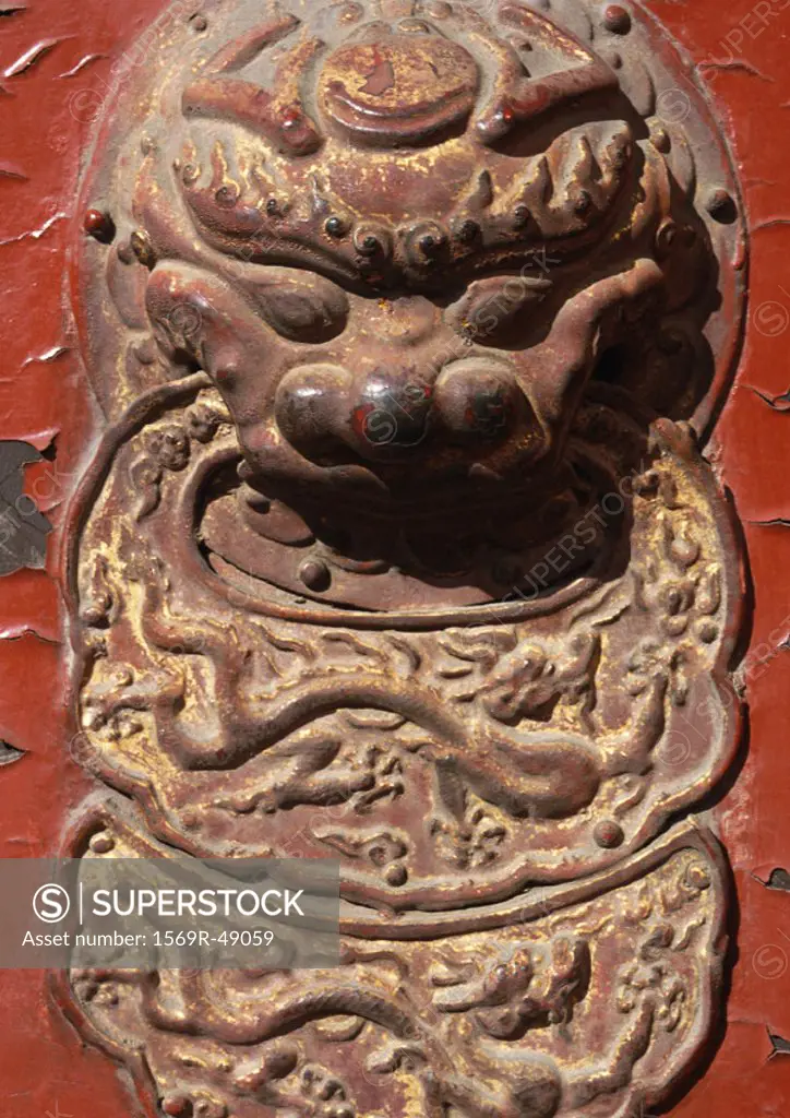 China, Beijing, Forbidden City, dragon detail on door, close-up