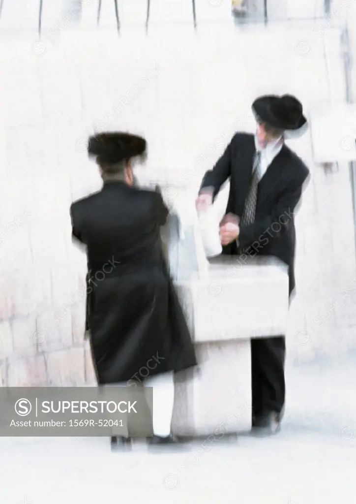 Israel, Jerusalem, two Orthodox Jews, blurred