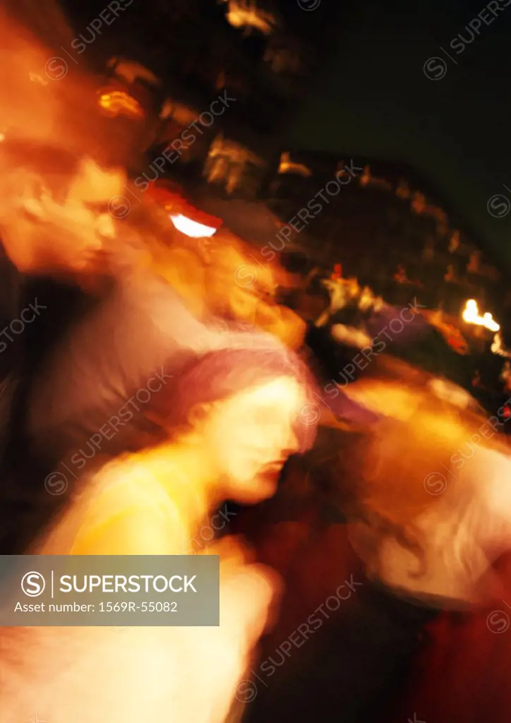 Crowd at night, blurred
