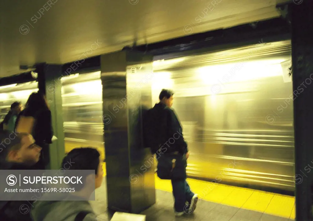 People standing on subway platform