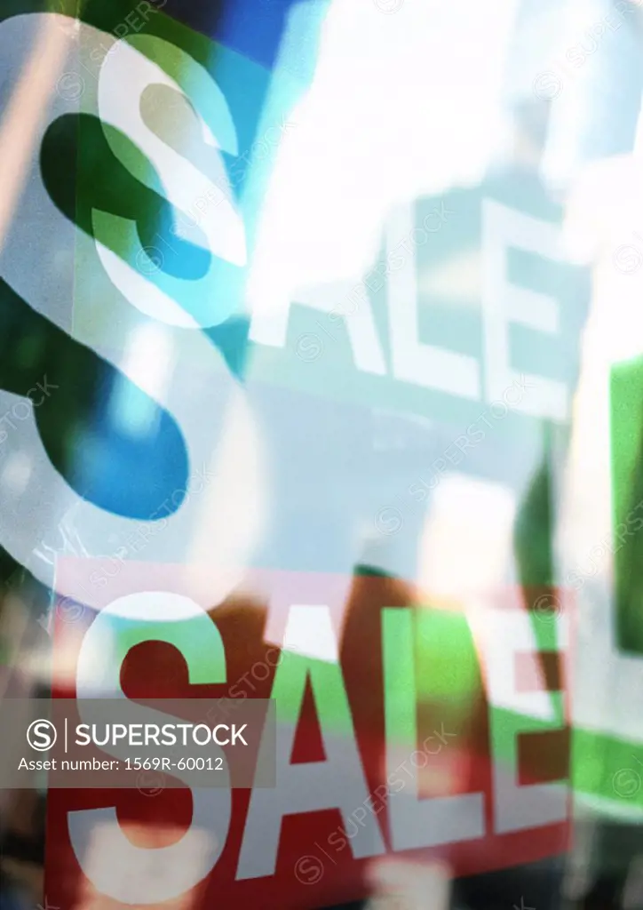 Word sale on shop windows, composite, close-up