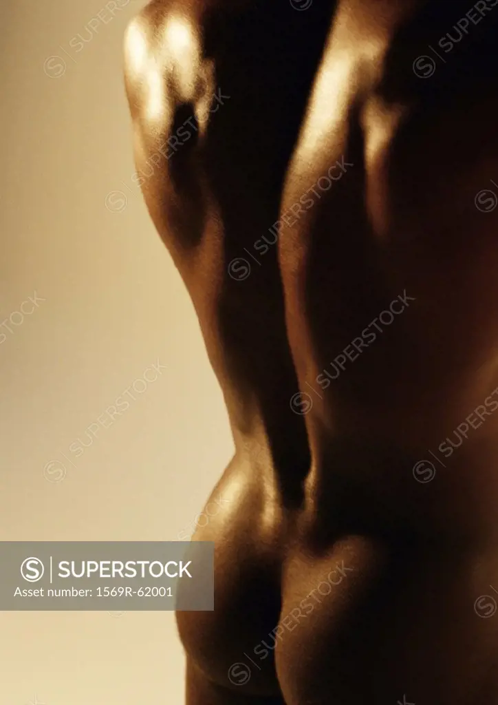 Man´s bare back and buttocks, close up