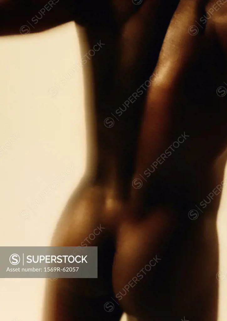 Man´s bare back and buttocks, close up